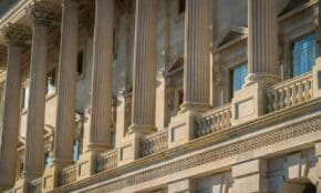 Close-up of columns and exterior architectural details of a historic landmark building.