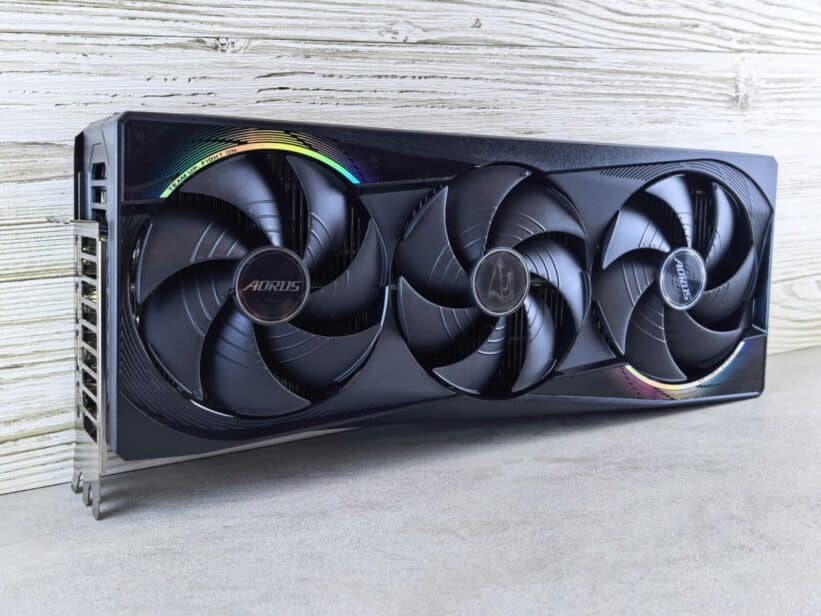 Triple fan GPU with RGB lighting, ideal for gaming setups and high-performance computing.