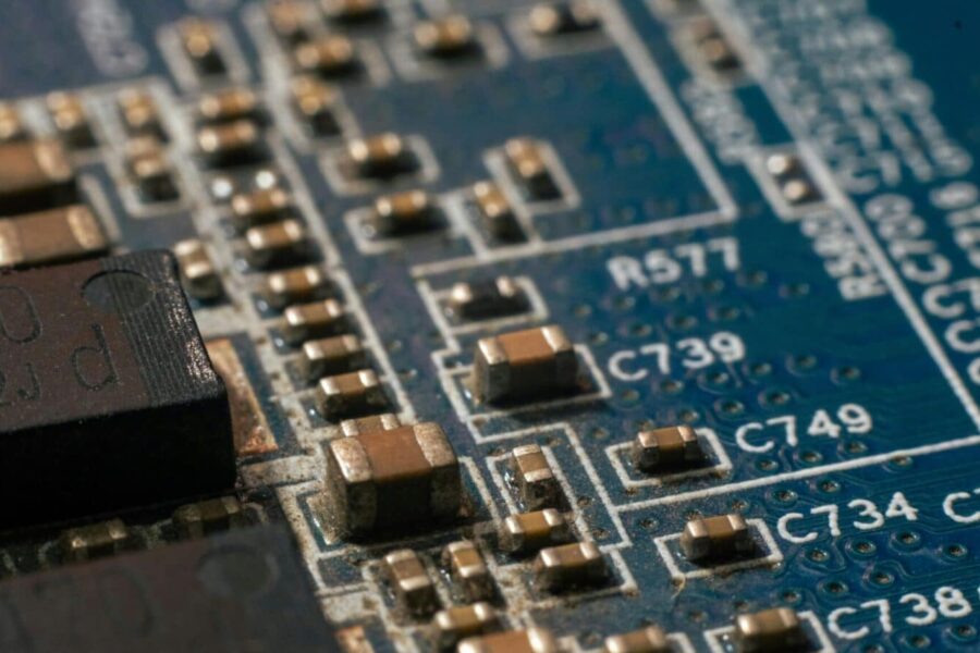 Detailed macro shot of a circuit board highlighting electronic components and traces.