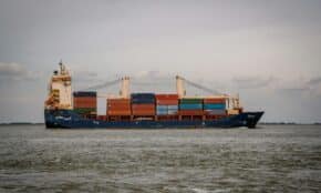 Container ship sailing through the waters of Terneuzen, Netherlands.