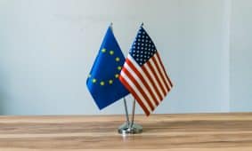 European union and us flags on a table