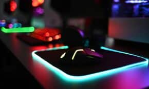 a computer mouse sitting on top of a mouse pad