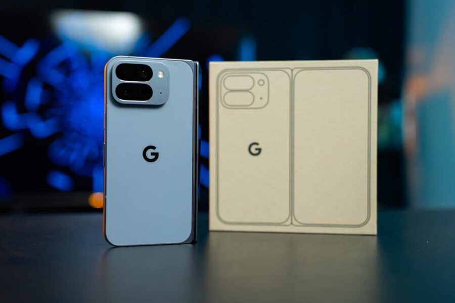 Light blue smartphone next to its packaging