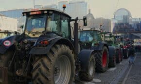 a row of tractors parked next to each other
