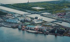 An aerial view of a city and a body of water