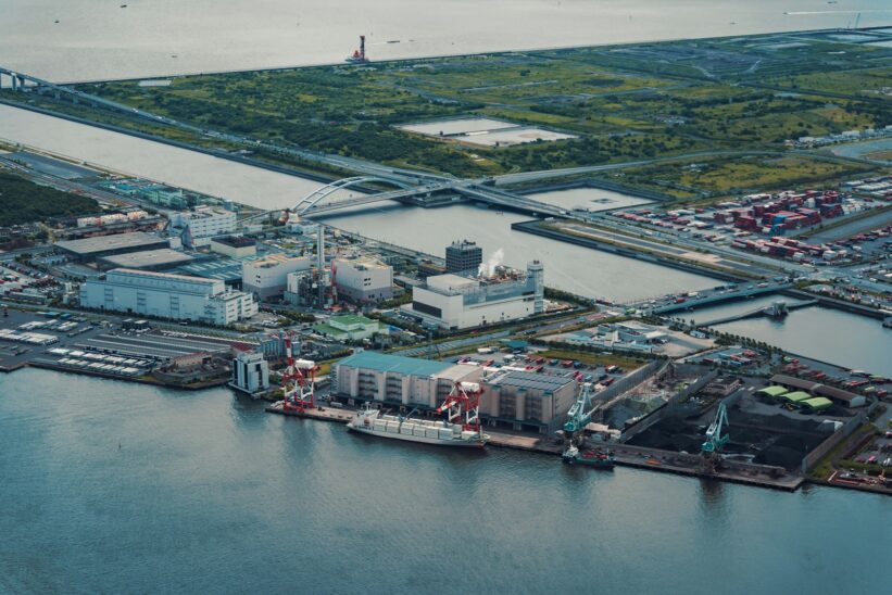 An aerial view of a city and a body of water