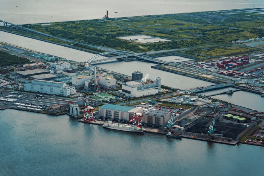 An aerial view of a city and a body of water