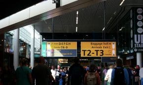 a group of people walking in a large building